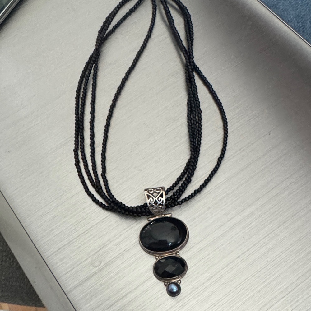 Elegant Black Beaded Necklace with Silver Accents